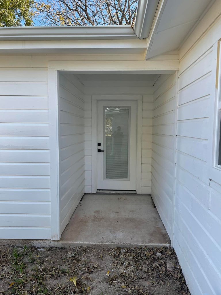 new siding installation on home entry